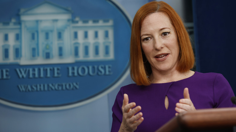 White House Press Secretary Jen Psaki gesturing at the podium