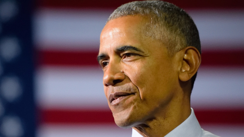 Barack Obama in front of the American flag