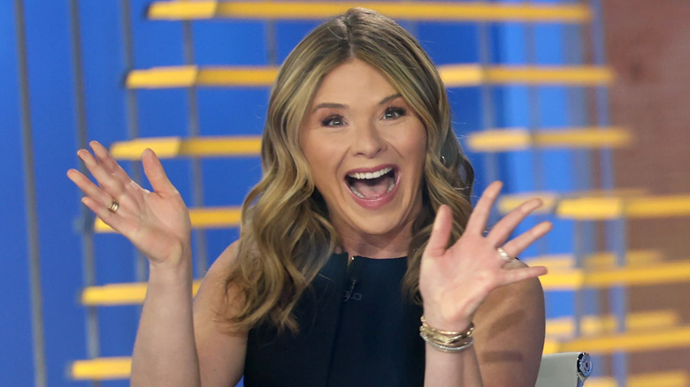 Jenna Bush Hager smiling with hands raised