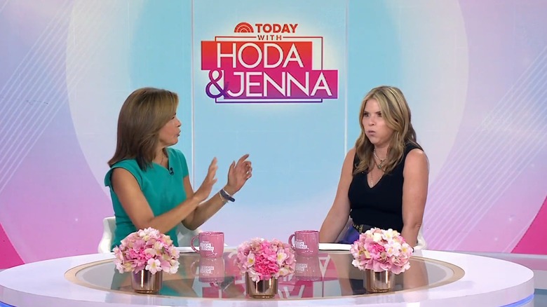 Hoda Kotb speaks and raises her hands while Jenna Bush Hager puffs out her cheeks on "Today"