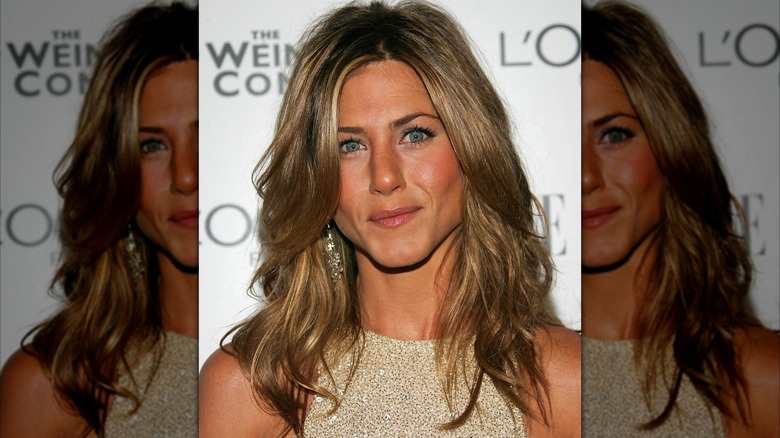 Jennifer Aniston posing at an event