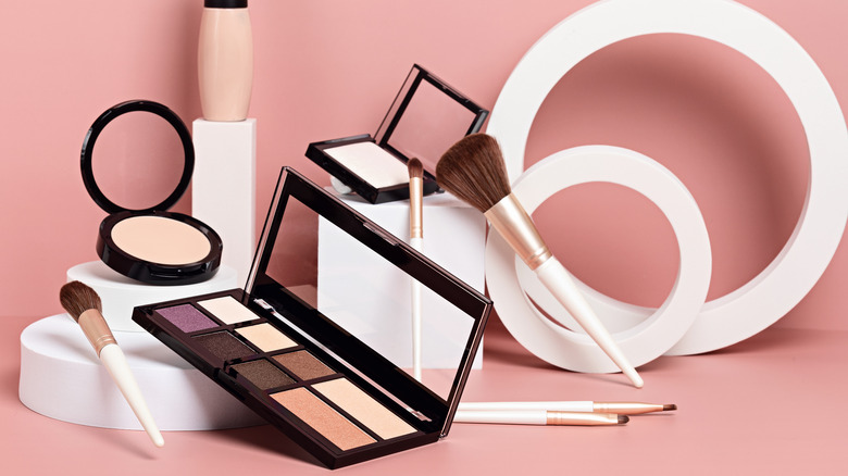 makeup palettes and products displayed 