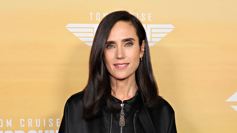 Jennifer Connelly smiling while posing at the New York screening of 