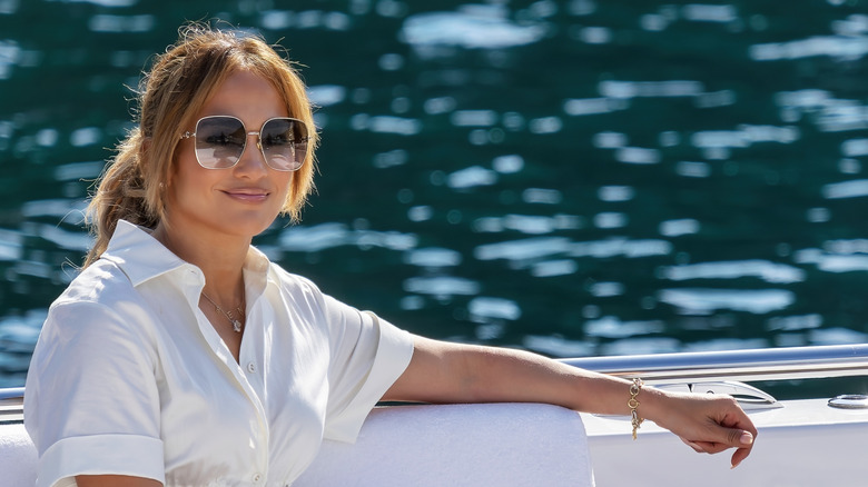 Jennifer Lopez smiling on a boat