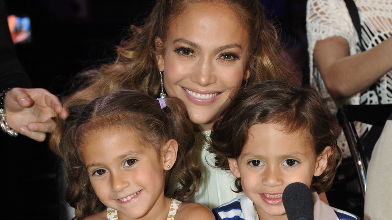 Jennifer Lopez smiling with her young twins