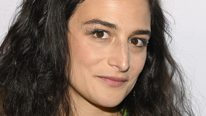 Jenny Slate wearing glittery makeup on red carpet