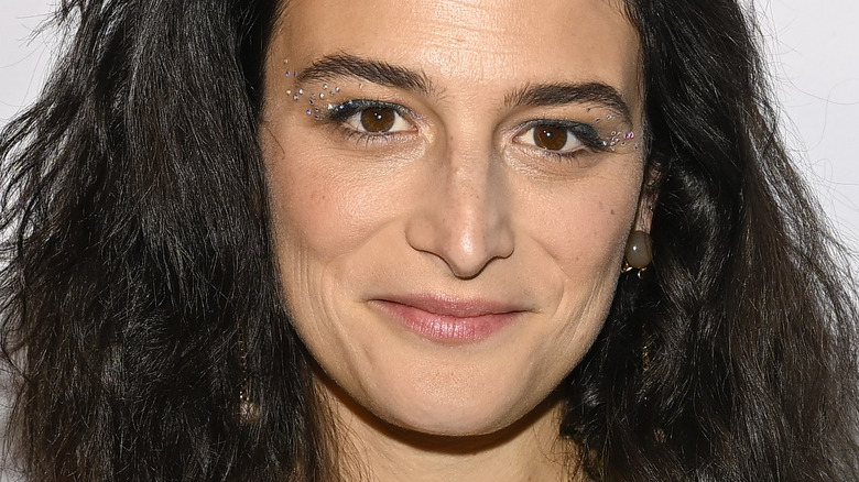 Jenny Slate smiling with glittery eyes