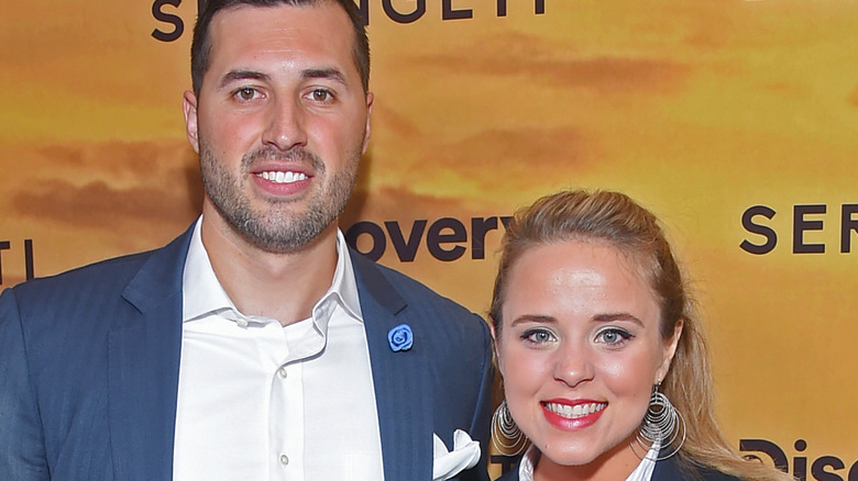 Jeremy and Jinger Vuolo smiling on red carpet