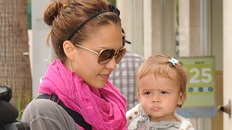 Jessica Alba holding baby Honor