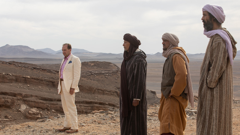 The Forgiven cast standing in the desert