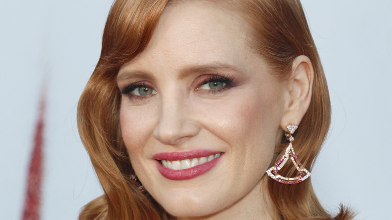 Jessica Chastain smiling on red carpet