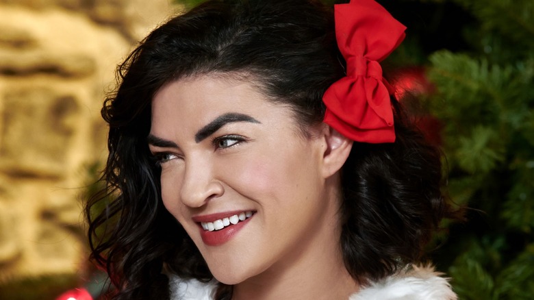 Jessica Szohr in Santa suit in "Designing Christmas"