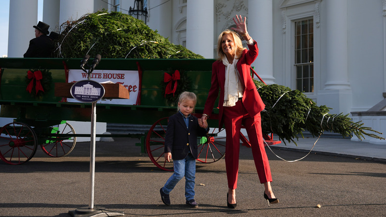 Jill Biden waving with grandchild