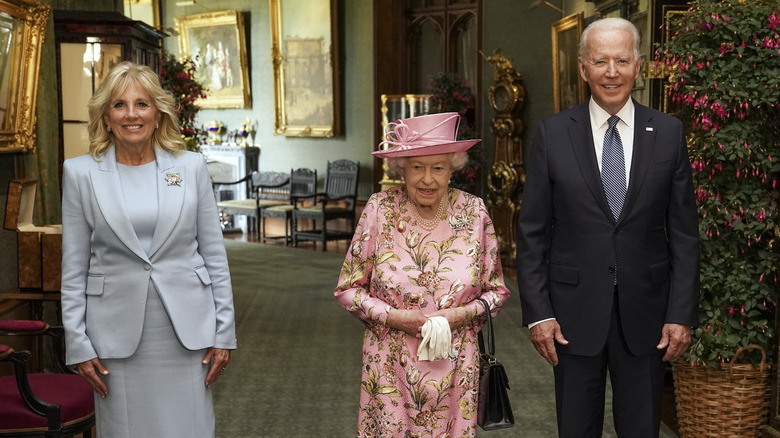 Jill Biden, Queen Elizabeth, Joe Biden posing together