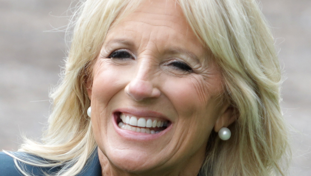 Jill Biden smiling wearing pearls