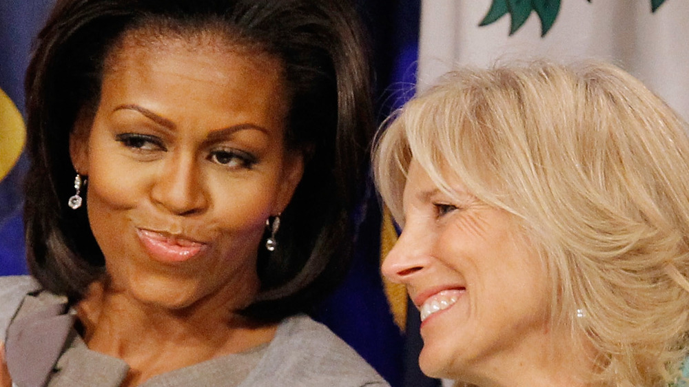 Jill Biden and Michelle Obama smiling together