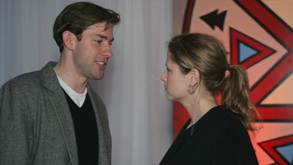 John Krasinski talking to Jenna Fischer