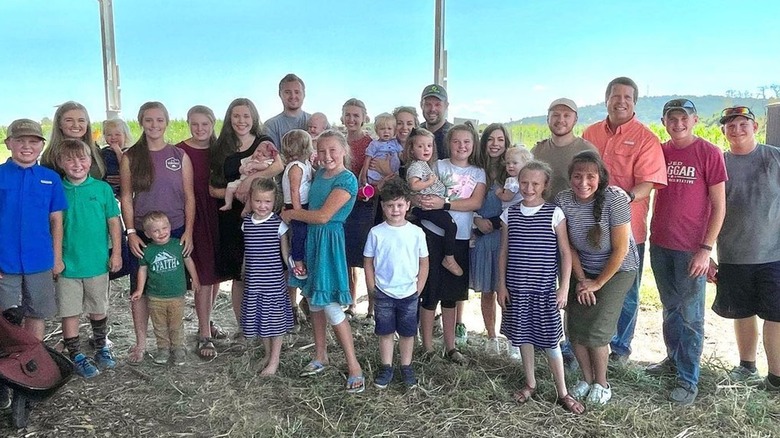 Duggar family and grandchildren at farm