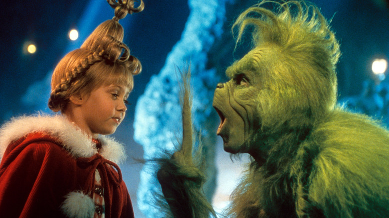 Taylor Momsen and Jim Carrey in "The Grinch"