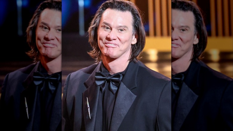 Jim Carrey long hair, black tuxedo