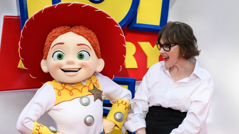 Joan Cusack (right) smiling and looking at to someone in a 