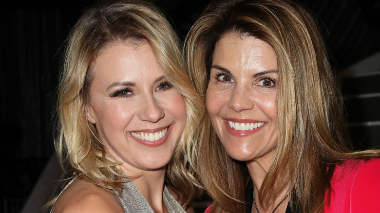 Jodi Sweetin and Lori Loughlin smiling