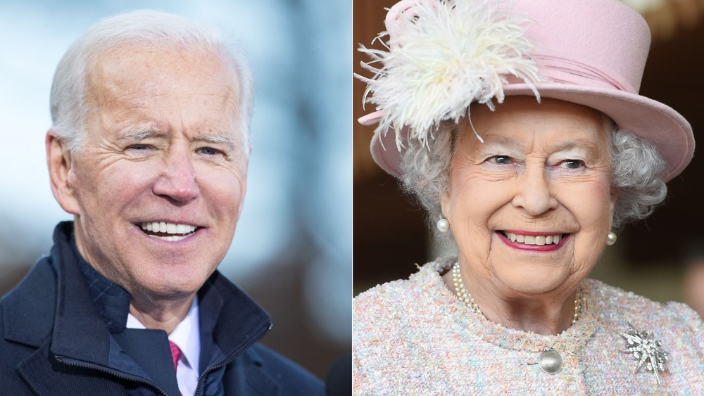 Joe Biden and Queen Elizabeth smiling 