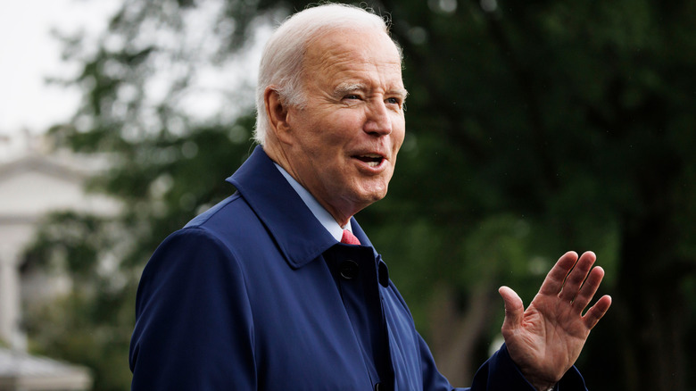 Joe Biden smiling and waving