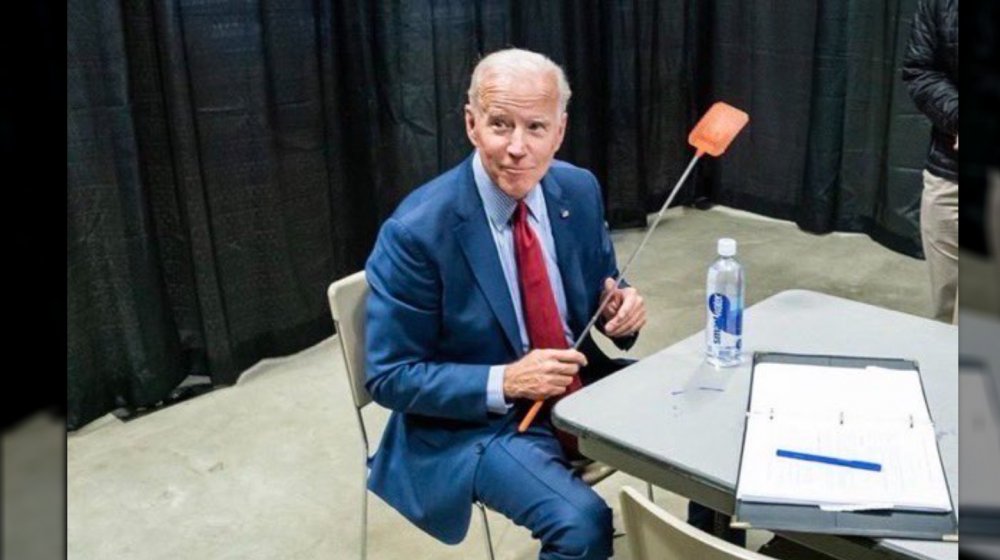 Presidential hopeful Joe Biden with a fly swatter