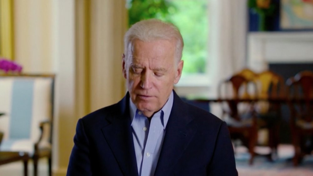 Joe Biden reading note to self