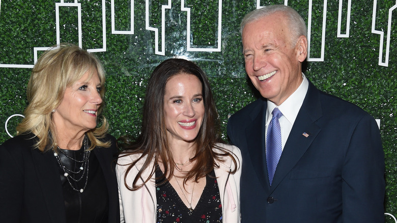 Joe Biden and Jill Biden smiling with Ashley Biden