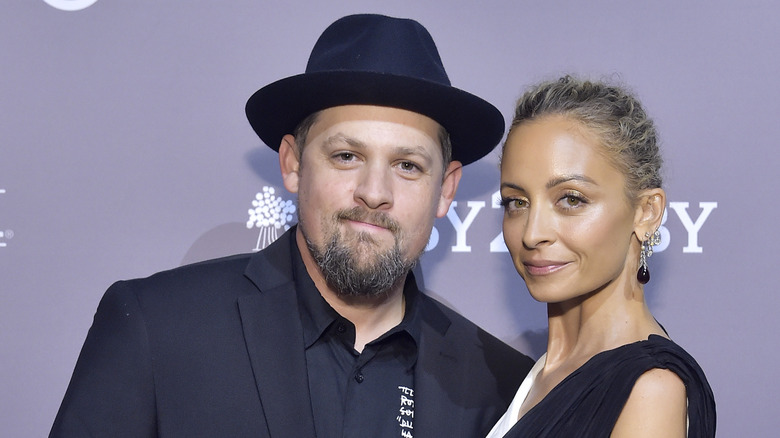 Nicole Richie and Joel Madden posing together
