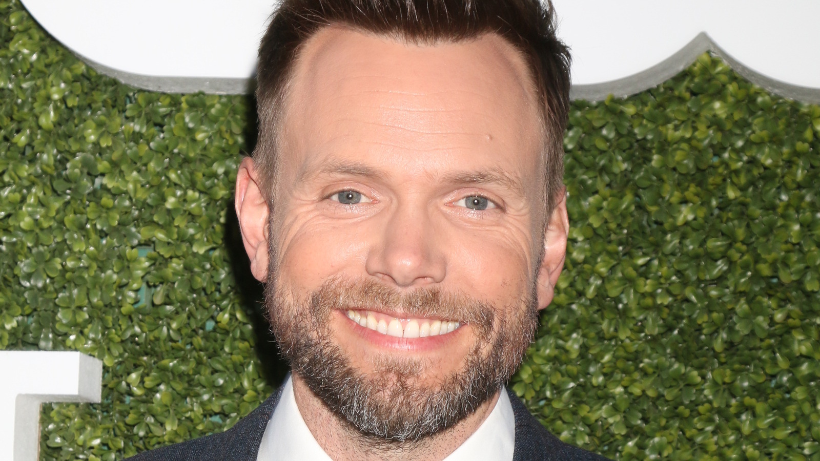 Joel McHale Opens Up About The Wild West Of 2000s Reality TV – Exclusive