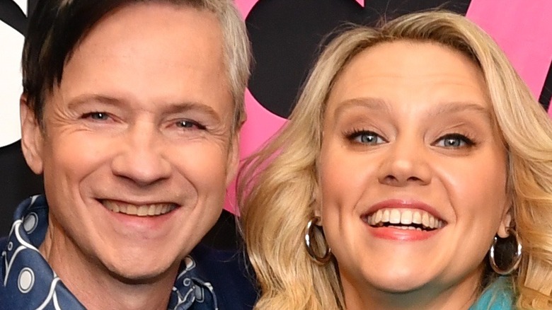 John Cameron Mitchell and Kate McKinnon smiling