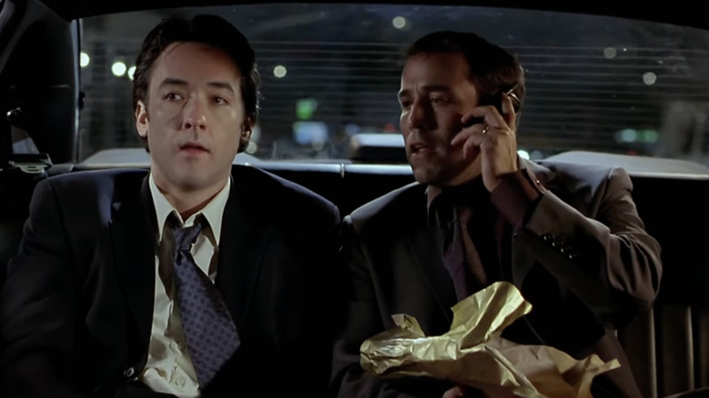 Jeremy Piven and John Cusack acting in a scene from Serendipity.