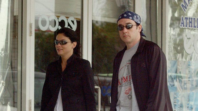 John Cusack and Jodi Lyn O'Keefe walking in Los Angeles