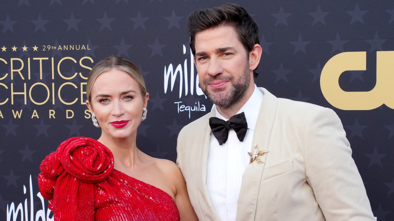 Emily Blunt and John Krasinski posing on the red carpet together