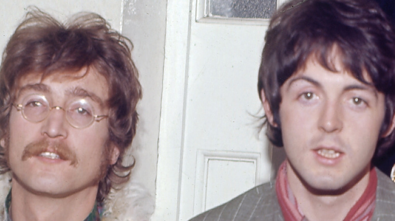 John Lennon, Paul McCartney posing