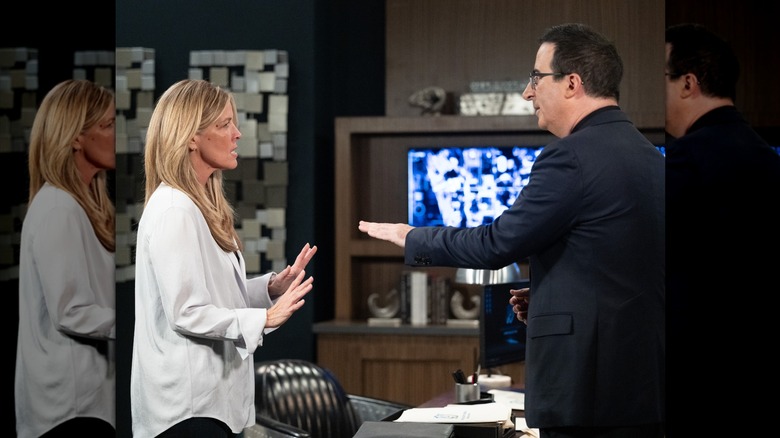 Laura Wright and John Oliver in character on General Hospital