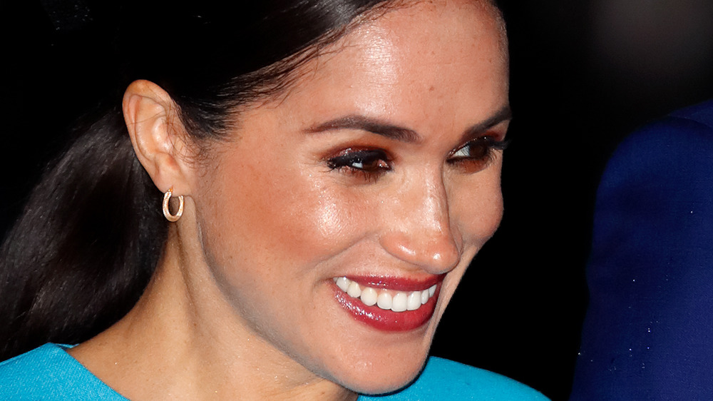 Meghan Markle in green hat