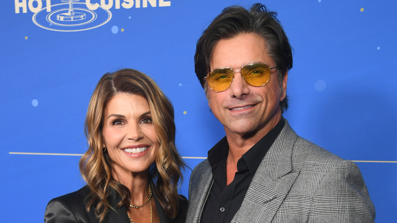 Lori Loughlin and John Stamos attend an event together