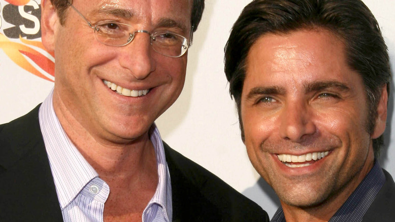 John Stamos and Bob Saget smiling together