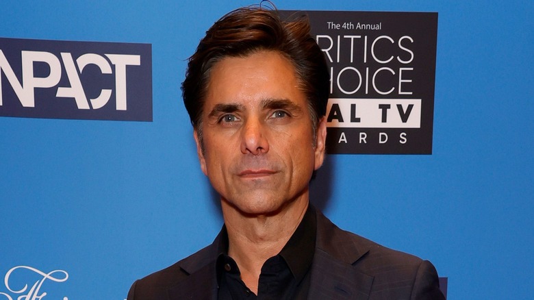 John Stamos at an event. 