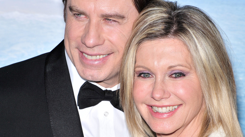 John Travolta and Olivia Newton-John smiling