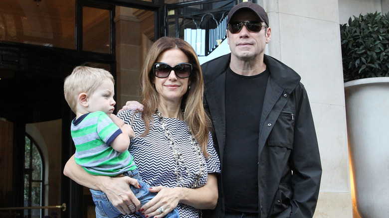 John Travolta, his wife Kelly Preston and their son Benjamin are seen at the 'Four Seasons George V' hotel on September 12, 2012 in Paris, France.