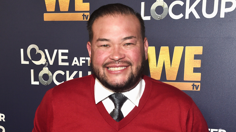Jon Gosselin smiling in red sweater