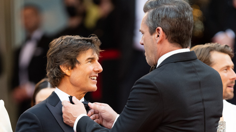 Jon Hamm fixing Tom Cruise's bowtie