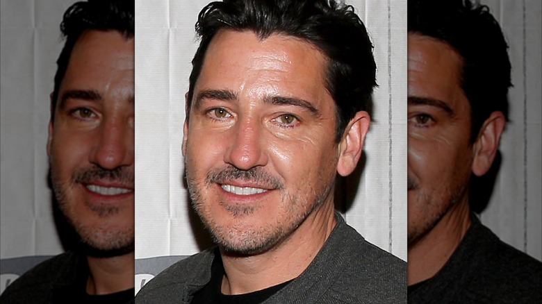Jonathan Knight smiling for a photo