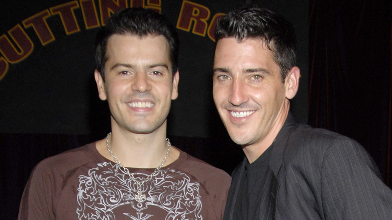 Jordan and Jonathan Knight posing for a photo