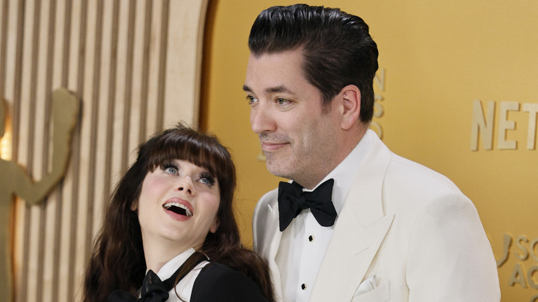 Zooey Deschanel and Jonathan Scott on the red carpet